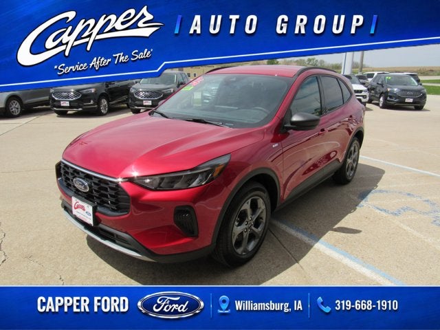 2026 Ford Escape ST-Line in Rapid Red Metallic Tinted Clearcoat — front three-quarter view