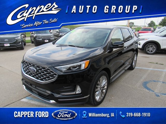 2024 Ford Edge Titanium in Agate Black Metallic — front three-quarter view