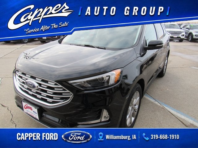 2024 Ford Edge Titanium in Agate Black Metallic — front three-quarter view
