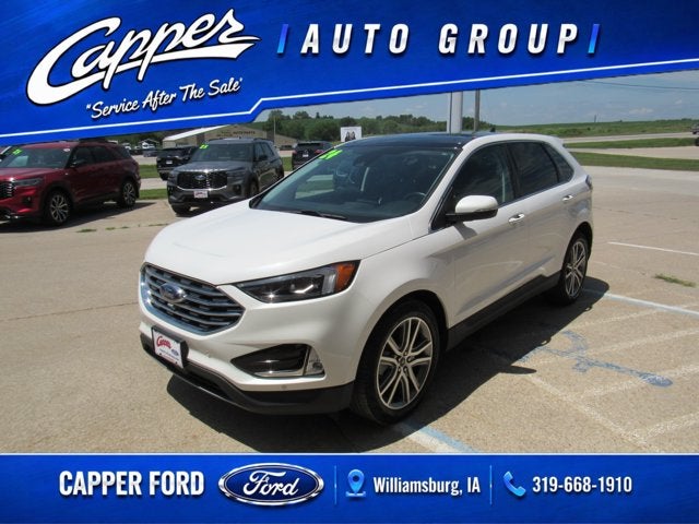 2024 Ford Edge Titanium in Star White Metallic Tri-Coat — front three-quarter view
